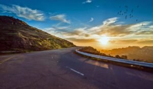 winding road, sunset, mountains-1556177.jpg